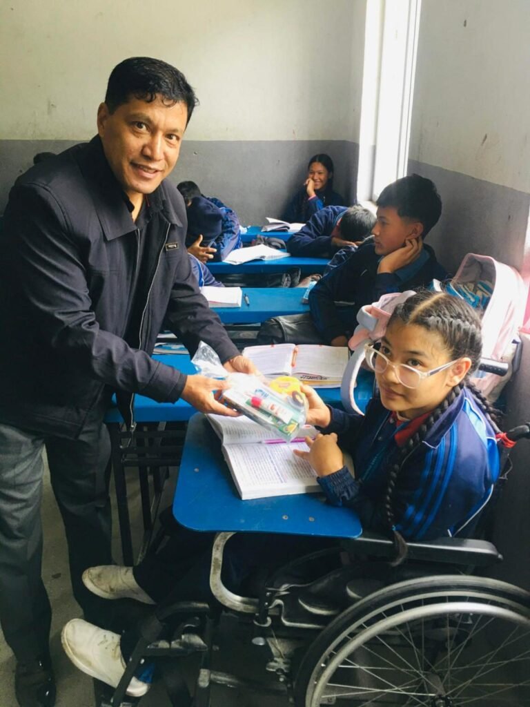 Care4Nepal supporting a student in her classroom