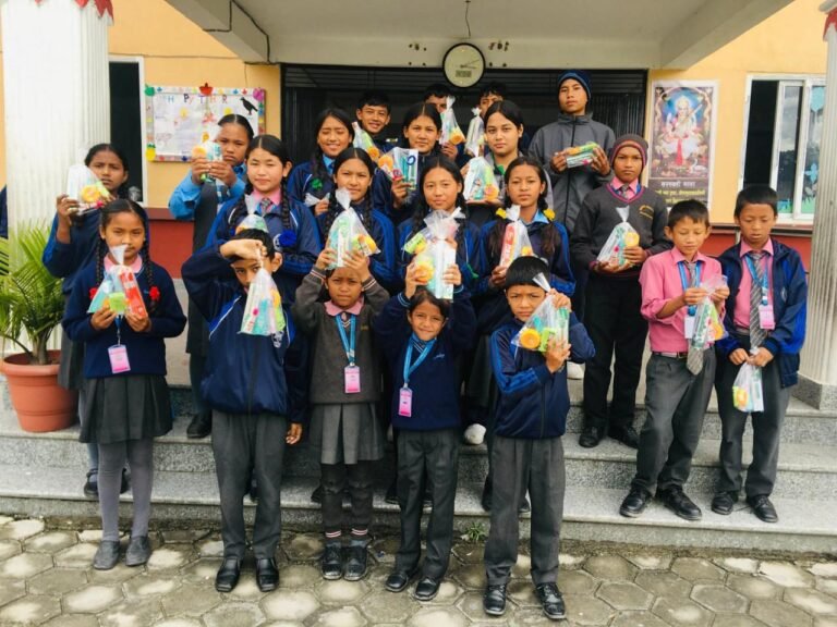 Schoolchildren with the supplies they received